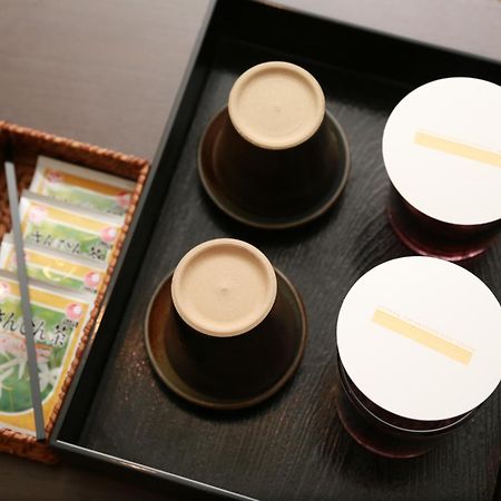 Hotel Hamahigashima Resort Урума Номер фото